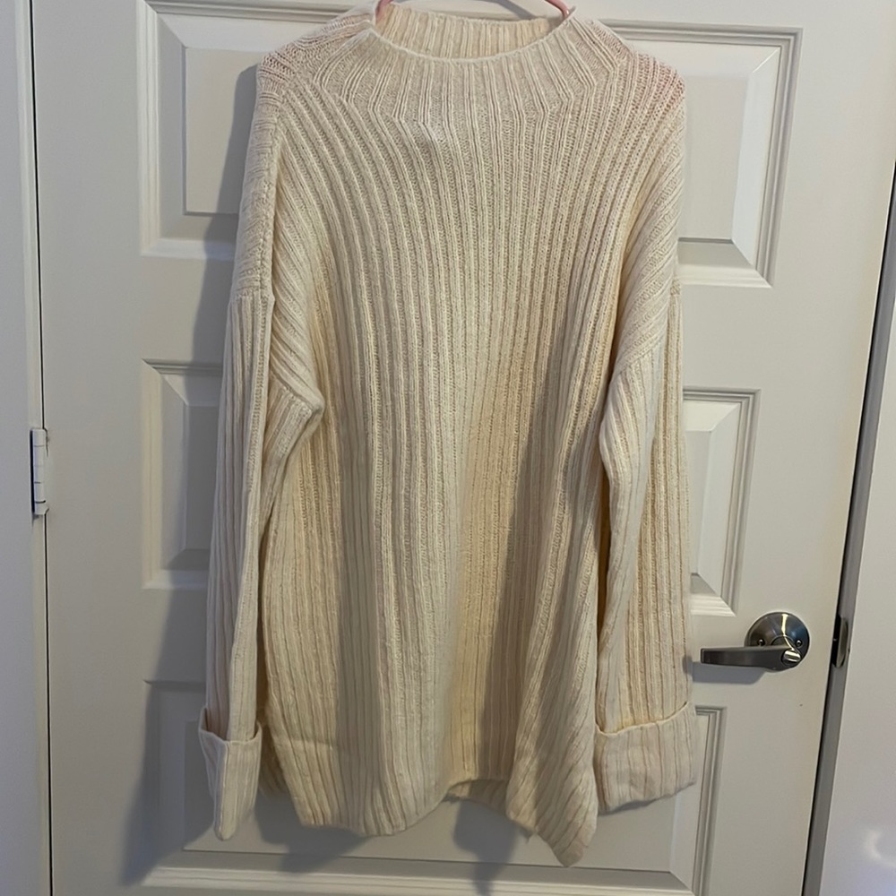 Cream colored sweatshirt
